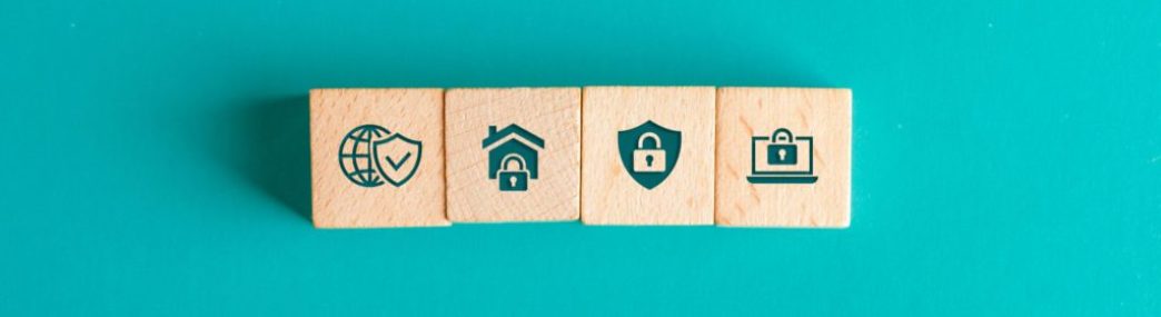 security-concept-with-icons-on-wooden-blocks-on-turquoise-table-flat-lay security-concept-with-icons-on-wooden-blocks-on-turquoise-table-flat-lay